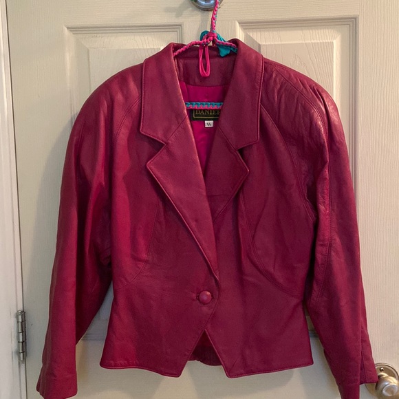 Leather bolero style jacket by Danier.  Colour of jacket is magenta. - Picture 1 of 2